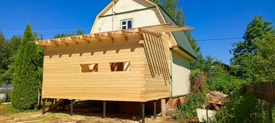 Пристройка из профилированного бруса 140*140 к дому. Южнофлотовец